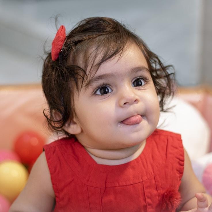 Kaveri Mehta, Lead Design Curator at Fresh Gradient Market, reviewing corporate floral arrangements